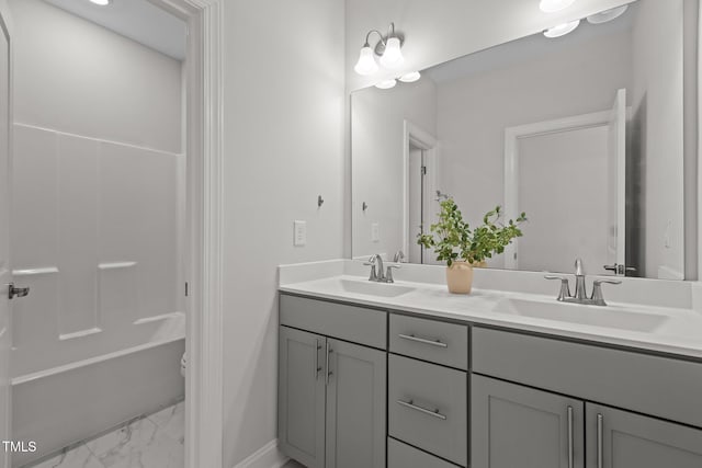 3020 Mavisbank Cir, Apex, NC 27502 - bathroom featuring double vanity, marble finish flooring, baseboards, toilet, and bathing tub / shower combination
