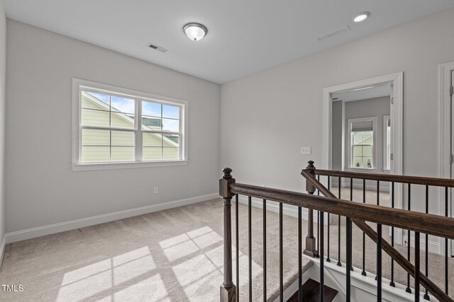 3020 Mavisbank Cir, Apex, NC 27502 - hall with an upstairs landing, light carpet, and baseboards