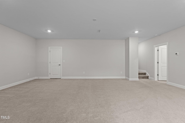 3020 Mavisbank Cir, Apex, NC 27502 - spare room featuring recessed lighting, light colored carpet, stairs, and baseboards
