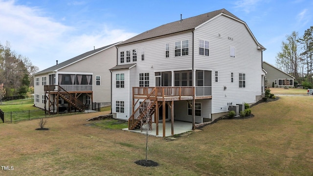 3020 Mavisbank Cir, Apex, NC 27502 - rear view of house featuring stairway, a sunroom, a deck, a patio area, and central air condition unit