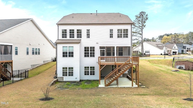 3020 Mavisbank Cir, Apex, NC 27502 - rear view of house with stairs, a deck, roof with shingles, a patio, and a sunroom