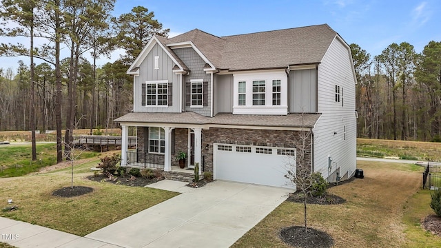 3020 Mavisbank Cir, Apex, NC 27502 - view of front of home with covered porch, a front lawn, a shingled roof, a garage, and concrete driveway