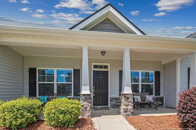 2240 Andalusian Dr, Hope Mills, NC 28348 - entrance to property featuring a porch and stone siding