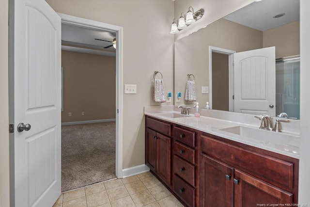 2240 Andalusian Dr, Hope Mills, NC 28348 - full bathroom with double vanity, tile patterned flooring, ceiling fan, and baseboards