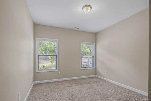 2240 Andalusian Dr, Hope Mills, NC 28348 - carpeted spare room with baseboards