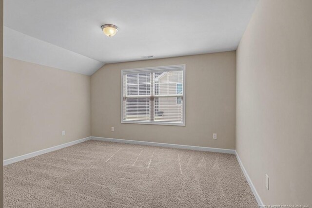 2240 Andalusian Dr, Hope Mills, NC 28348 - empty room with light colored carpet, lofted ceiling, and baseboards