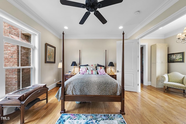 8042 N NC Highway 58, Castalia, NC 27816 - bedroom featuring baseboards, light wood-style floors, a chandelier, ornamental molding, and ceiling fan