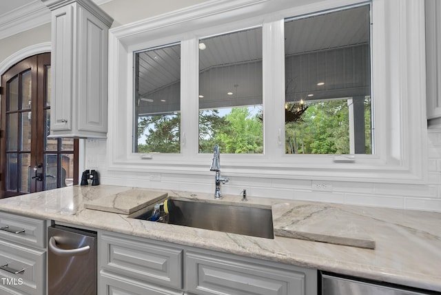 8042 N NC Highway 58, Castalia, NC 27816 - kitchen featuring a sink, light stone counters, and dishwasher