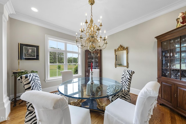8042 N NC Highway 58, Castalia, NC 27816 - dining room featuring a chandelier, ornamental molding, recessed lighting, wood finished floors, and baseboards