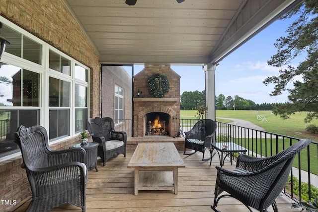 8042 N NC Highway 58, Castalia, NC 27816 - wooden deck featuring an outdoor living space with a fireplace, a yard, and view of golf course