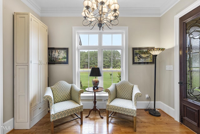 8042 N NC Highway 58, Castalia, NC 27816 - sitting room with plenty of natural light, a chandelier, crown molding, and wood finished floors