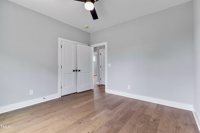 2521 Newbold St, Raleigh, NC 27603 - unfurnished bedroom featuring baseboards, light wood-style flooring, and a ceiling fan