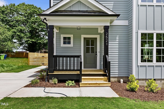 2521 Newbold St, Raleigh, NC 27603 - property entrance featuring board and batten siding and covered porch