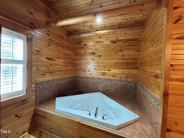 603 Hugo St, Durham, NC 27704 - full bath featuring a jetted tub, wood walls, and wooden ceiling