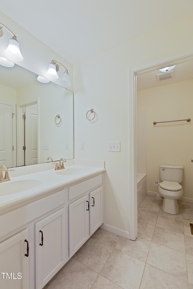 317 Springhurst Ln, Cary, NC 27511 - full bathroom featuring double vanity, tile patterned floors, toilet, baseboards, and shower / washtub combination