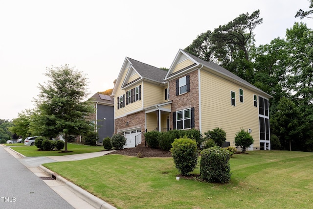 317 Springhurst Ln, Cary, NC 27511 - view of front of house with a garage, concrete driveway, a front lawn, and stone siding