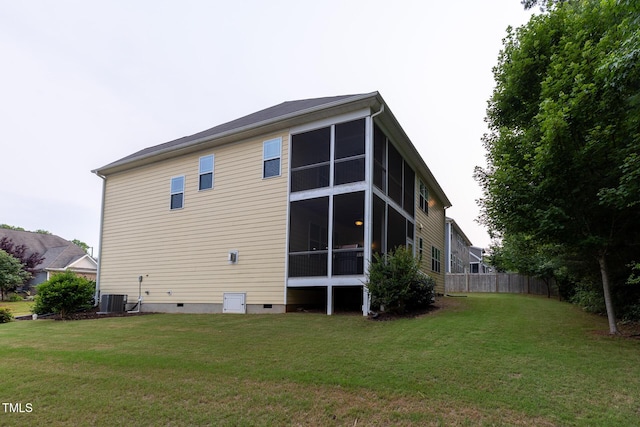 317 Springhurst Ln, Cary, NC 27511 - rear view of property with crawl space, a sunroom, and central air condition unit