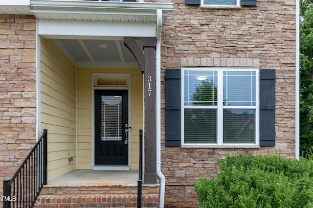 317 Springhurst Ln, Cary, NC 27511 - view of exterior entry with stone siding