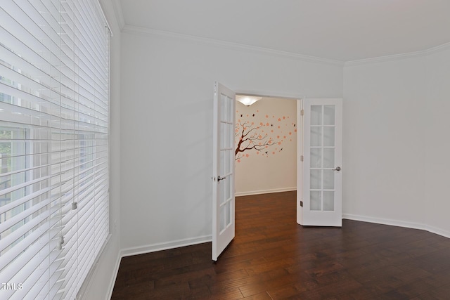 317 Springhurst Ln, Cary, NC 27511 - empty room with french doors, ornamental molding, dark wood-style floors, and baseboards