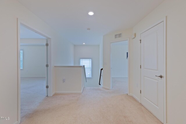 317 Springhurst Ln, Cary, NC 27511 - corridor with an upstairs landing, carpet, recessed lighting, and baseboards