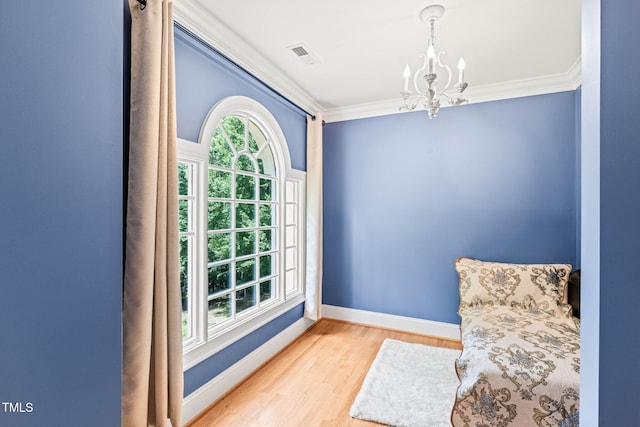1317 Woodgate Manor Ct, Raleigh, NC 27614 - unfurnished room featuring a chandelier, crown molding, and wood finished floors