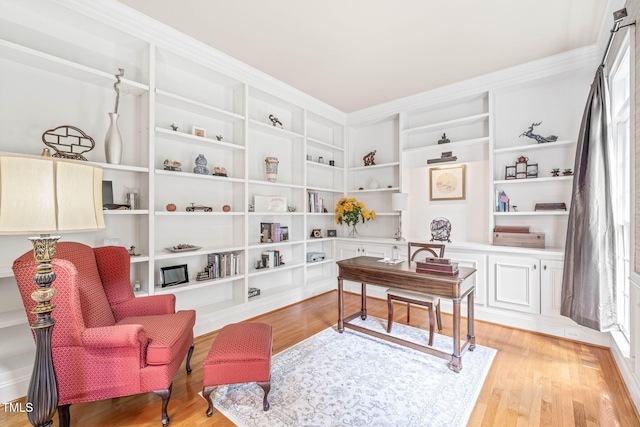 1317 Woodgate Manor Ct, Raleigh, NC 27614 - sitting room with light wood-style floors and built in shelves