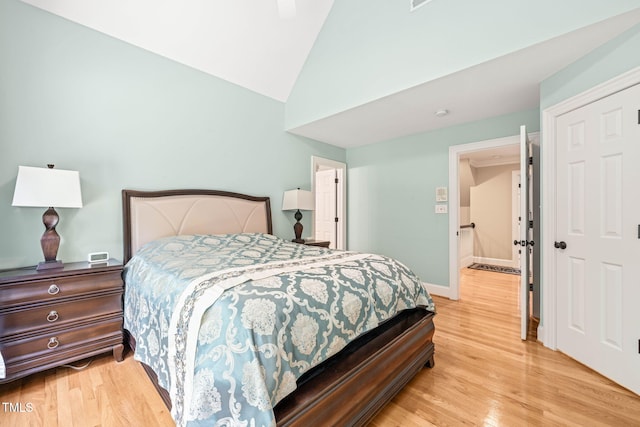 1317 Woodgate Manor Ct, Raleigh, NC 27614 - bedroom featuring lofted ceiling and light wood finished floors