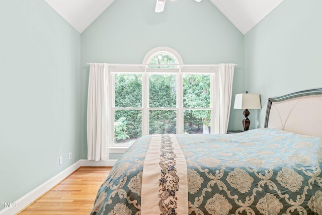 1317 Woodgate Manor Ct, Raleigh, NC 27614 - bedroom with lofted ceiling and wood finished floors