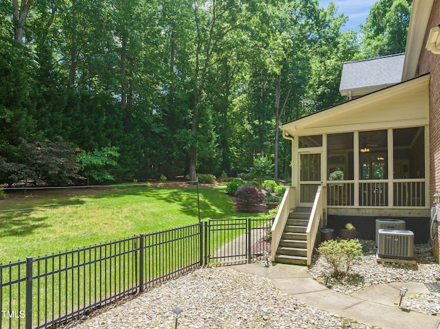 1317 Woodgate Manor Ct, Raleigh, NC 27614 - fenced yard with a sunroom and stairway