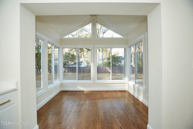 1204 Windemere Pl, Wilson, NC 27893 - unfurnished sunroom featuring baseboards, wood finished floors, and lofted ceiling