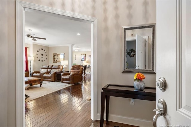 220 Hugh Shelton Loop, Fayetteville, NC 28303 - corridor with wood finished floors, ornamental molding, and baseboards