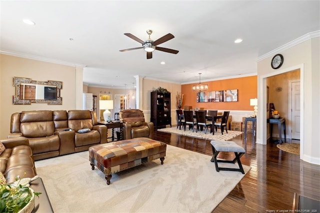 220 Hugh Shelton Loop, Fayetteville, NC 28303 - living room featuring a ceiling fan, ornamental molding, wood finished floors, recessed lighting, and a chandelier