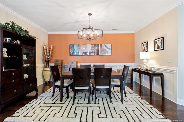220 Hugh Shelton Loop, Fayetteville, NC 28303 - dining area featuring a chandelier, wood finished floors, crown molding, and wainscoting