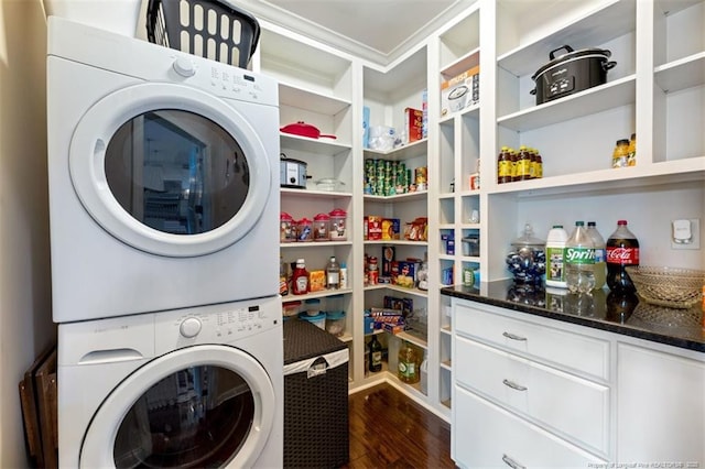 220 Hugh Shelton Loop, Fayetteville, NC 28303 - laundry area featuring stacked washing machine and dryer and dark wood-type flooring