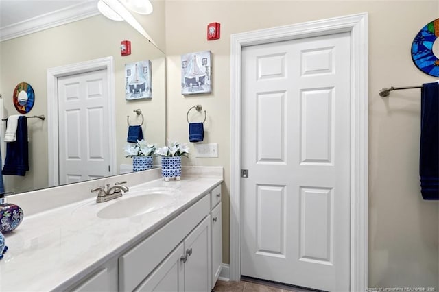220 Hugh Shelton Loop, Fayetteville, NC 28303 - bathroom featuring vanity, crown molding, and baseboards