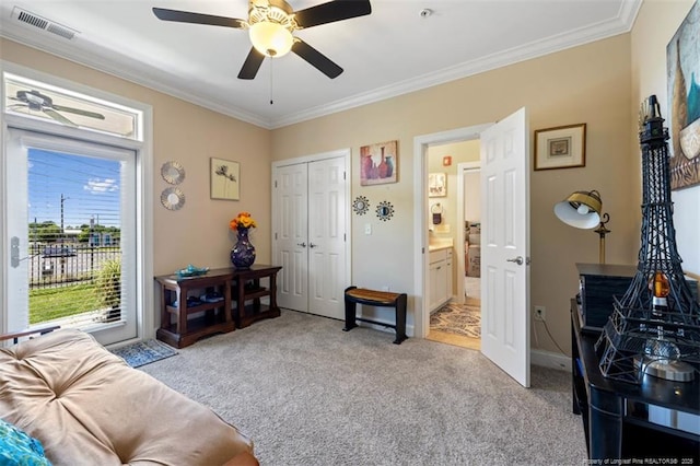 220 Hugh Shelton Loop, Fayetteville, NC 28303 - living area featuring light carpet, ornamental molding, ceiling fan, and baseboards