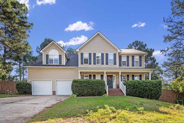 40 Union Cir, Lillington, NC 27546 - view of front facade featuring a porch, concrete driveway, an attached garage, and roof with shingles