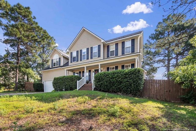 40 Union Cir, Lillington, NC 27546 - traditional-style house featuring covered porch and an attached garage
