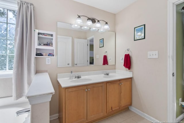 40 Union Cir, Lillington, NC 27546 - full bathroom featuring double vanity, tile patterned floors, and baseboards