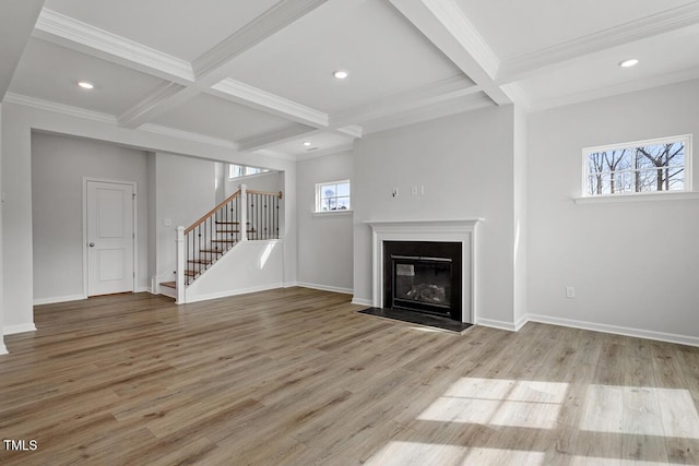 219 Berry Mill Ln Unit 179, Raleigh, NC 27603 - unfurnished living room featuring coffered ceiling, stairway, beam ceiling, wood finished floors, and ornamental molding