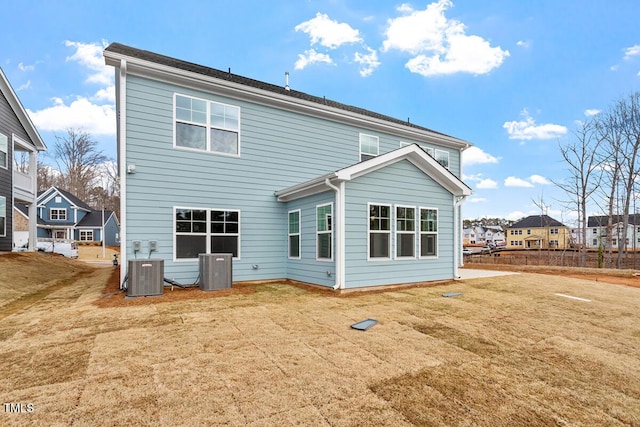 219 Berry Mill Ln Unit 179, Raleigh, NC 27603 - rear view of property featuring cooling unit and a lawn