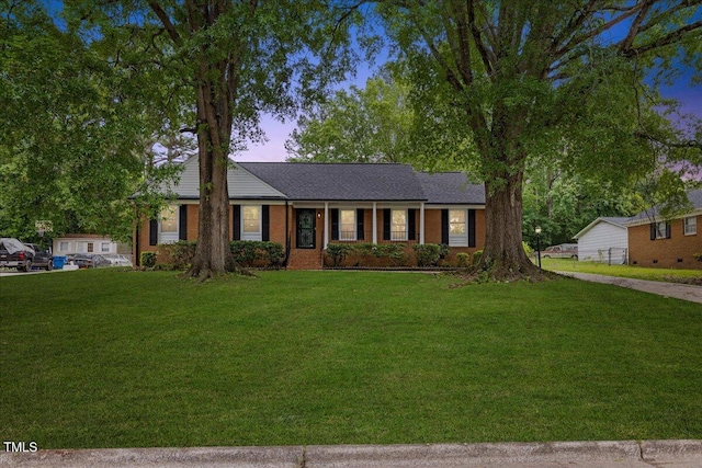 5110 Old Well St, Durham, NC 27704 - ranch-style house featuring a lawn