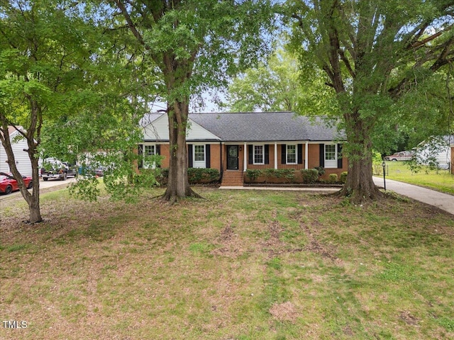5110 Old Well St, Durham, NC 27704 - ranch-style home featuring brick siding and a front yard