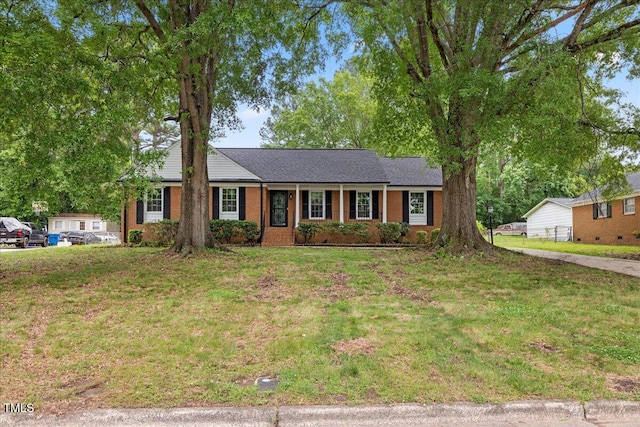 5110 Old Well St, Durham, NC 27704 - ranch-style house featuring a front yard