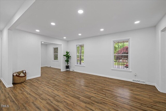 5110 Old Well St, Durham, NC 27704 - unfurnished room featuring dark wood-style floors, recessed lighting, and baseboards