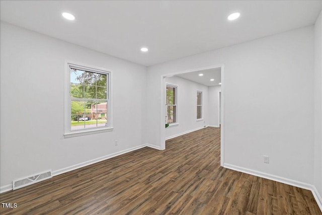5110 Old Well St, Durham, NC 27704 - spare room with dark wood-style flooring, baseboards, and recessed lighting