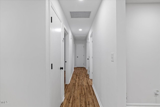 5110 Old Well St, Durham, NC 27704 - hallway with attic access, wood finished floors, baseboards, and recessed lighting