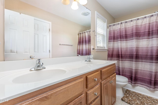 6 N Carolina Ave, Benson, NC 27504 - full bathroom featuring double vanity, toilet, tile patterned flooring, and a shower with curtain