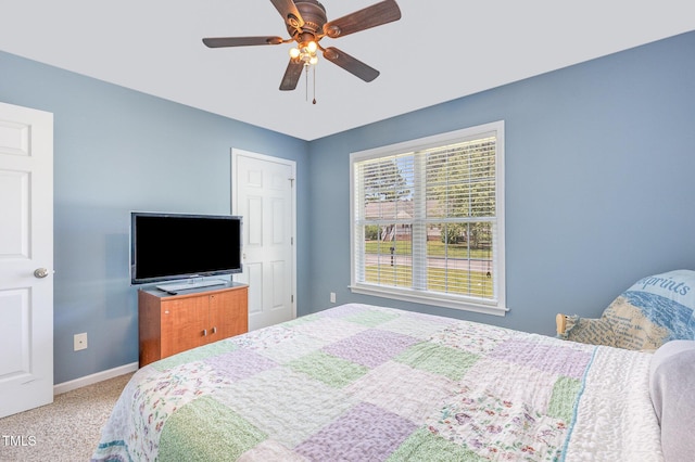 6 N Carolina Ave, Benson, NC 27504 - carpeted bedroom with baseboards and ceiling fan