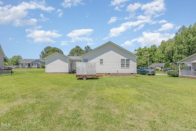 6 N Carolina Ave, Benson, NC 27504 - back of house featuring crawl space and a yard